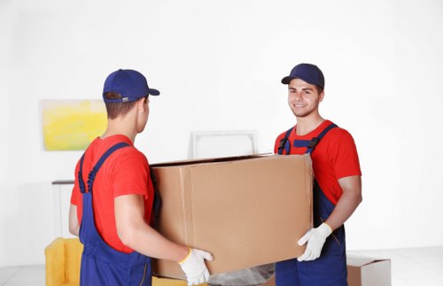 Local team removing unwanted furniture from a Harrow property