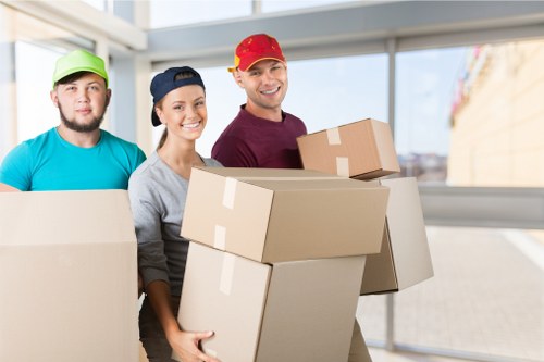 Removal team packing and preparing household items for a Harrow move