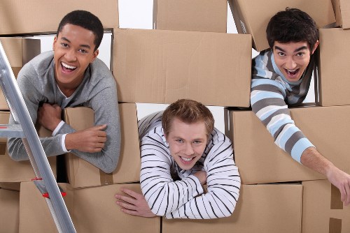 Packed boxes and moving supplies ready for a flat move in Harrow
