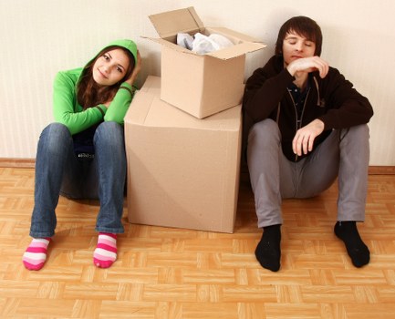 House removal team planning a move in a Harrow residential street
