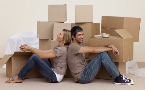 Packed boxes and furniture prepared for removal truck hire