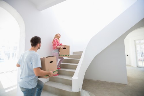 Local moving truck helping with furniture transport in Harrow