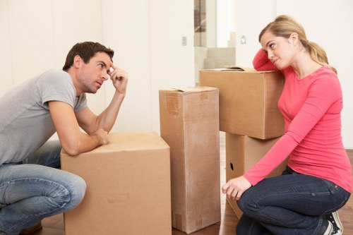 Eco-friendly removals team planning a recycling-focused move