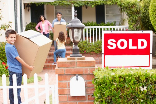 Furniture and boxes being delivered to a new Harrow home